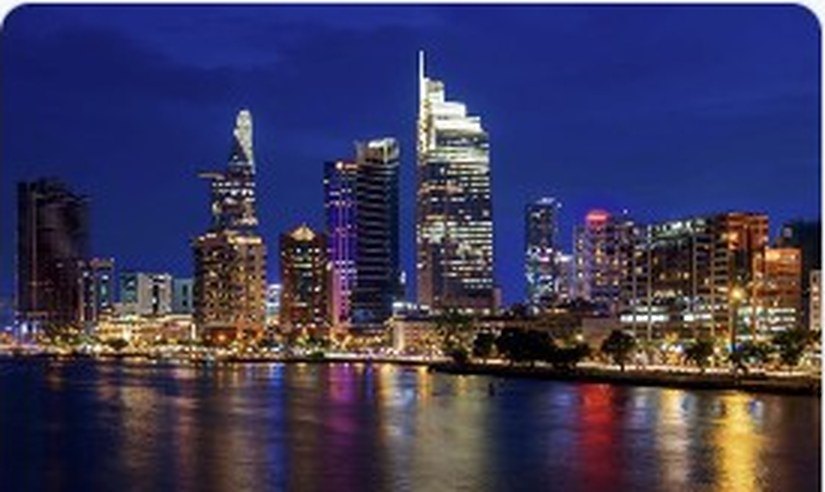 Saigon skyline along the river at night